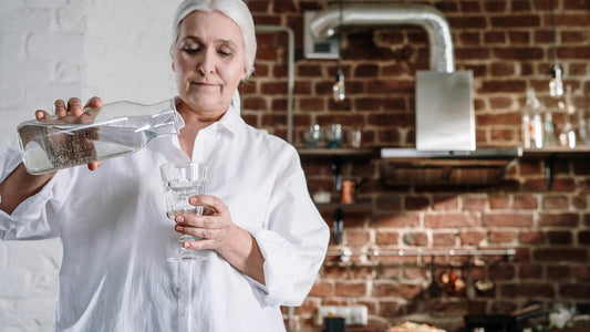 woman measuring hydrogen water