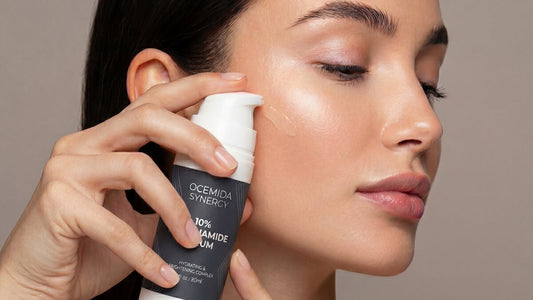 woman applying niacinamid serum to face