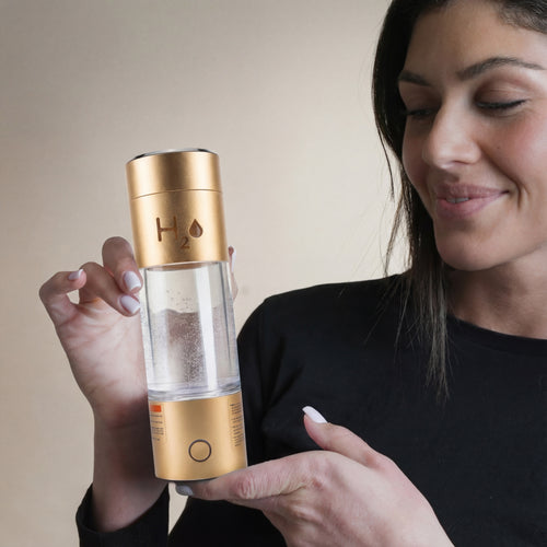 Gold hydrogen water bottle with certification logos
